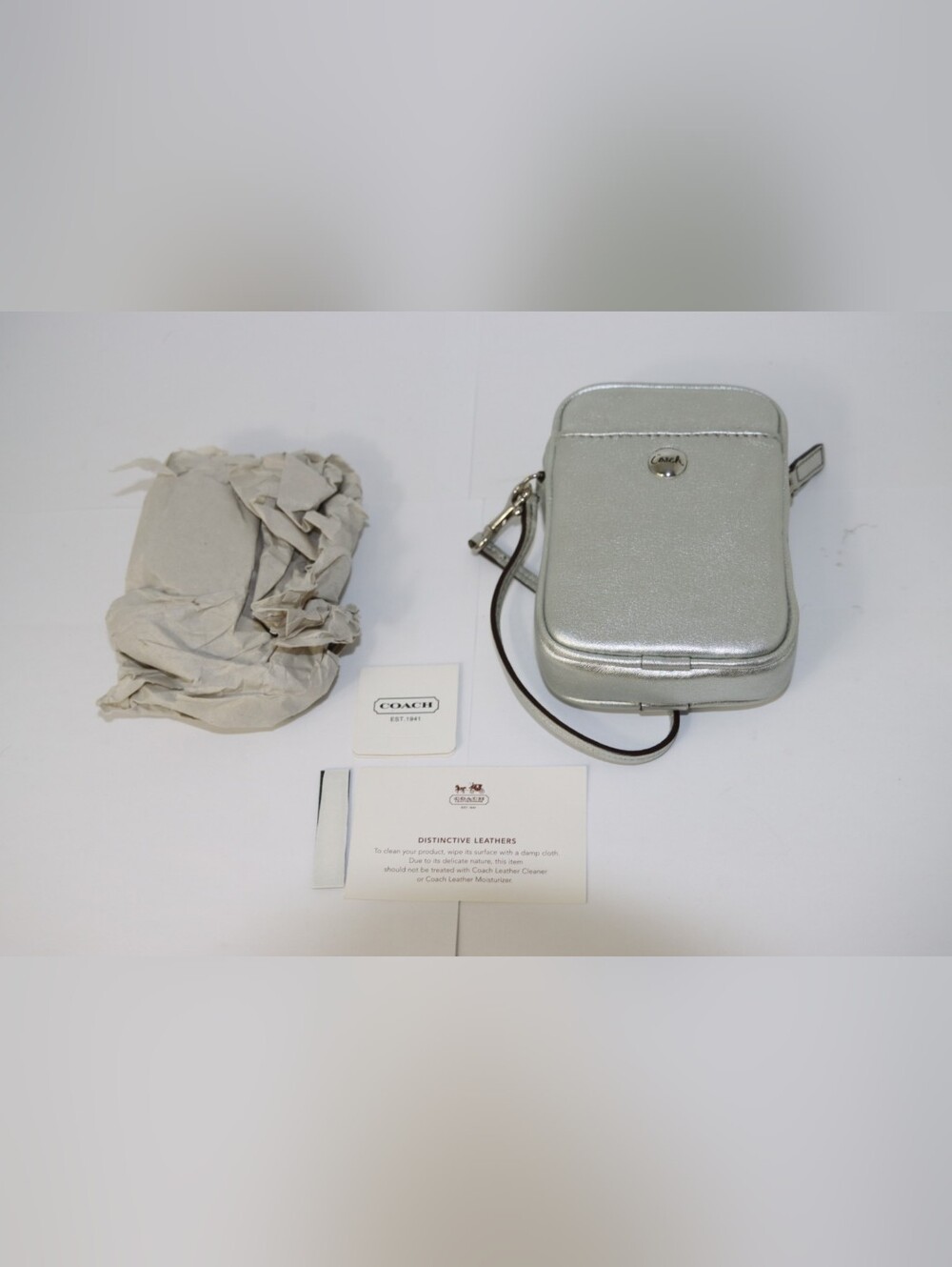 Coach Silver Metallic Wristlet Camera Bag